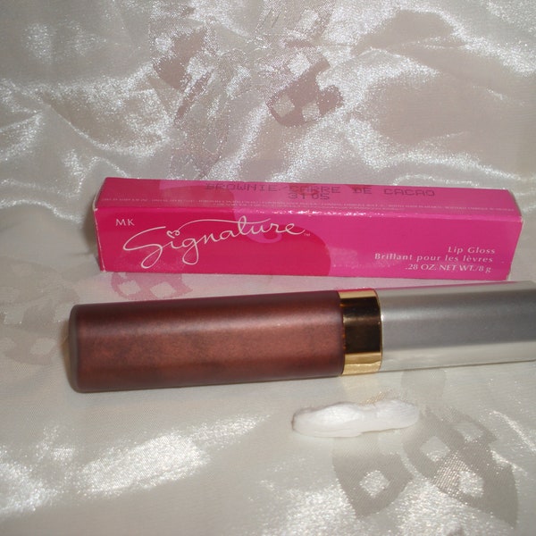 Mary Kay Lip Gloss Brownie a brown shade Wear over lipstick 4 inches long Full tube .28 oz. Full size Shine Rich color Sale Shop