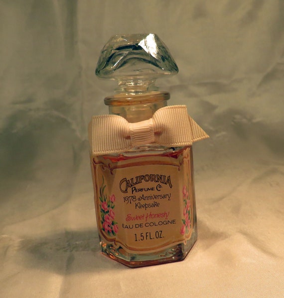 Avon California Perfume Co. 1978 Anniversary Keepsake Sweet Honesty Cologne fragrance perfume 3 7 8 inches tall 1.5 oz. Full bottle Sale