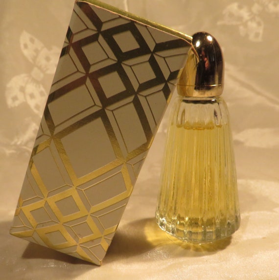 Avon vintage Charisma Demi Cologne Full .5 oz. bottle Dab on fragrance perfume 3 1 8 inches tall Gold foil gift box Sale InonasCosmetics