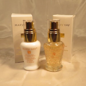 Mary Kay Day-botanicals & Night Solution-Gently exfoliates Full size set 4-1/8&quot; tall All skin types for face 1 oz. each Anti-aging complex