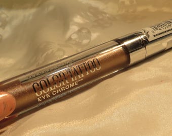 Light gold beautiful Eye shadow Chrome shimmer Luster shade 4-11/16" long Maybelline clear tube InonasCosmetics Sale