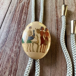 Vintage Japanese Resin Ancient people Bolo Tie Necklace