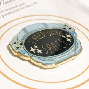 Spaceman pun enamel pin