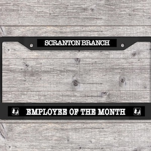 Dunder Mifflin Employee of the Month (Assorted) - Matte Black (Metal) License Plate Frame (The Office - TV show-themed)