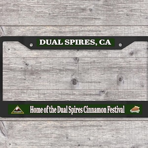 Dual Spires - Home of the Cinnamon Festival - Matte Black (Metal) License Plate Frame (Psych-themed)