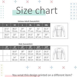 May include: A size chart for unisex adult and kids sweatshirts. The chart includes measurements in inches and centimeters for body length and half chest width. The text "Size chart" is at the top. The chart also includes images of the sweatshirts.