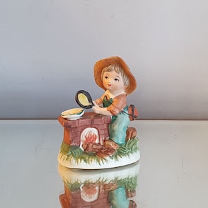 Vintage porcelain figurine. &quot;Boy at the stove&quot;. 1970.