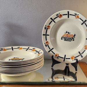 Set of 8 vintage &quot;Badonviller&quot; earthenware soup plates with fruit and basket decorations. Made in France 1950.