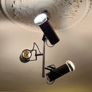 Vintage pendant light with 3 adjustable tube spotlights. 1970s. Retro metal light fixture from the 1970s.