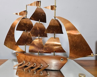 Vintage boat model in rosewood wood and copper sail. Made in France 1950s.