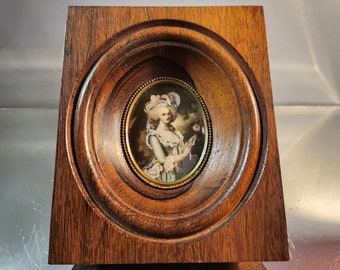 Miniature painting on ivory. Portrait of Marie Antoinette with a rose. France 1900s.