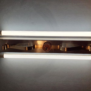 Vintage aluminum ceiling light with neon tubes. Made in France 1950. Retro tube light fixture.