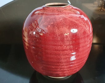 Vintage oxblood ceramic ball vase. Made in France 1970.