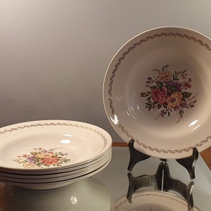 Set of 6 vintage earthenware soup plates with flower decorations. Made in France 1950.