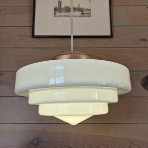 Art Deco pendant light in brass and opaline, 35 cm. Made in France, 1930s.