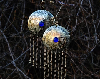 Very large "Odyssey" shield earrings in engraved brass and blue glass cabochon