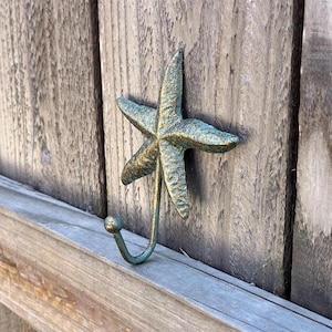 Starfish wall hook; cast iron starfish; metal starfish wall hook; metall hook; beach house decor; beach theme; housewarming gift; nautical