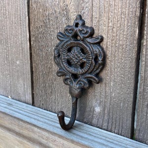 Cast iron wall hook; decorative wall hook; metal towel hook; cast iron towel hook; rustic home decor; shabby chic decor; housewarming gift