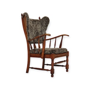 1960s, Danish design, renovated-reupholstered high-back ear flap chair, sheepskin, oak wood.