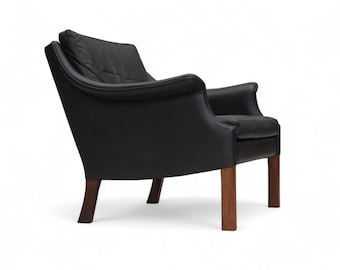 1970s, Danish design by Aage Christensen, armchair, model “Monark“, leather, teak wood.