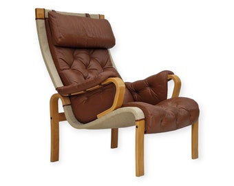 1970-80s, Danish design by Jeki Møbler, armchair in leather, beech bent wood.