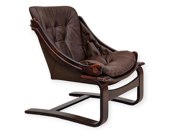 1970s, brown leather lounge chair by Ake Fribytter for Nelo Sweden.