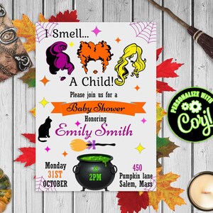 May include: A Halloween-themed baby shower invitation with the text "I Smell... A Child!" and the names of the parents. The invitation features illustrations of witch hair, a black cat, a cauldron, and a broom. The date and time are also included.