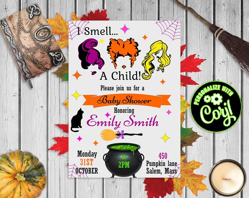 May include: A Halloween-themed baby shower invitation with the text "I Smell... A Child!" and the names of the parents. The invitation features illustrations of witch hair, a black cat, a cauldron, and a broom. The date and time are also included.