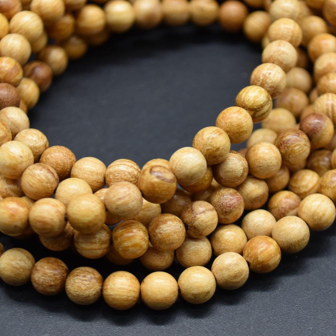 Bracelet PALO SANTO perle ronde 8 mm - La Porte des Secrets