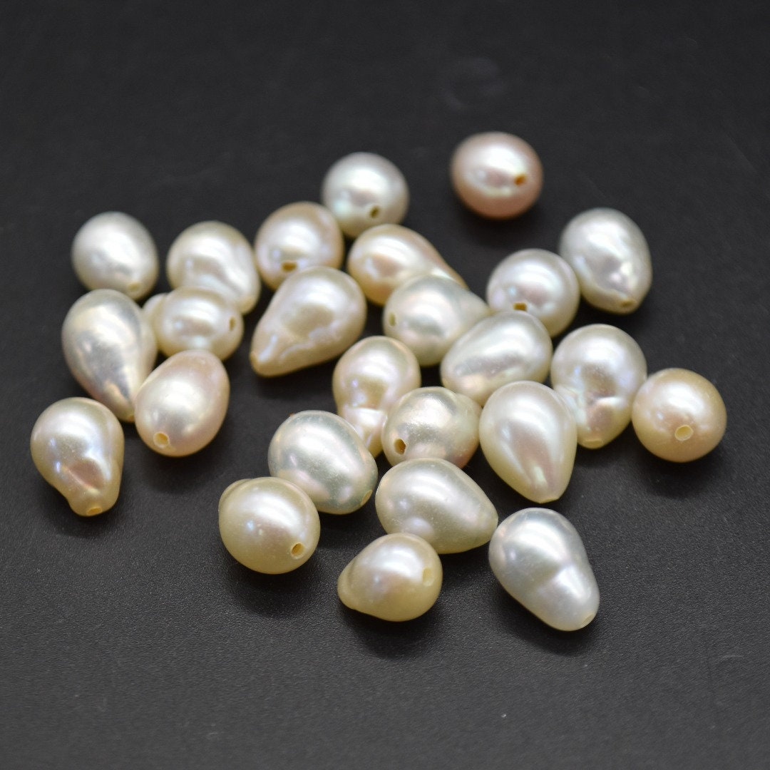 Orecchini pendenti con perle d'acqua dolce barocche in argento