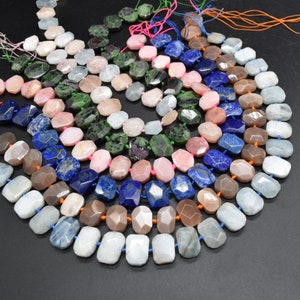 May include: A strand of faceted gemstone beads in various colours, including blue, green, pink, and brown. The beads are strung on a thin cord and are ready to be used for jewellery making.