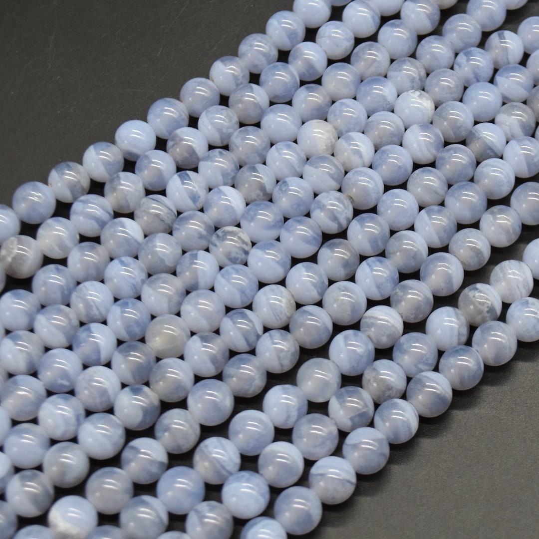 Pietra Pazza Blu Ruzzolata Dell'agata Del Pizzo Su Bianco Fotografia - Foto 7