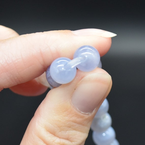 Pietra Pazza Blu Ruzzolata Dell'agata Del Pizzo Su Bianco Fotografia - Foto 5