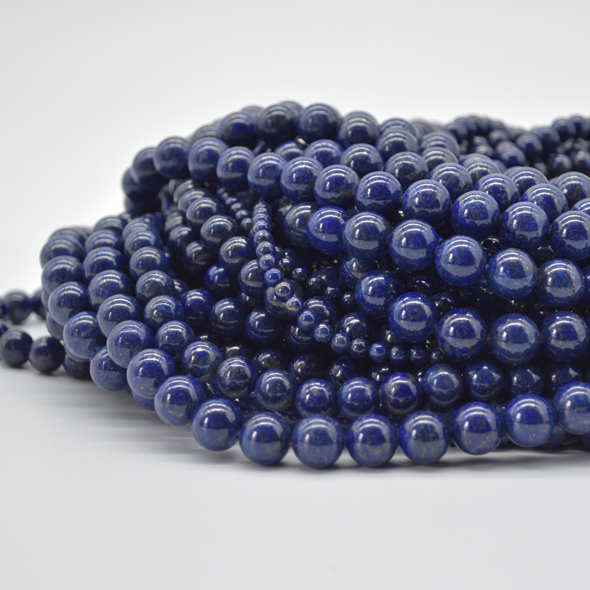 High Quality Grade A Natural Lapis Lazuli (with more gold Pyrite) Sem…