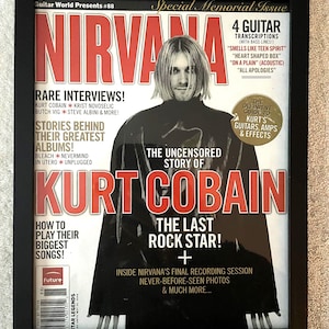 May include: Framed magazine cover featuring Kurt Cobain of Nirvana. The cover has a black frame and features the band's name in large red letters. Text includes "Rare Interviews!" and "The Last Rock Star!"