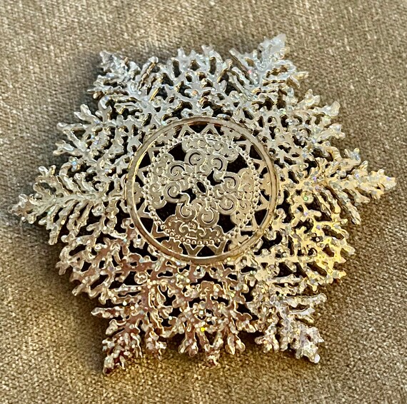 Silver Tone MMA Snow Flake Brooch