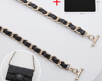 May include: A gold-tone metal chain strap interwoven with black leather, featuring toggle clasps at both ends. A black rectangular tag measures 8.5 cm by 5.4 cm. An inset shows a black quilted bag with the chain attached.