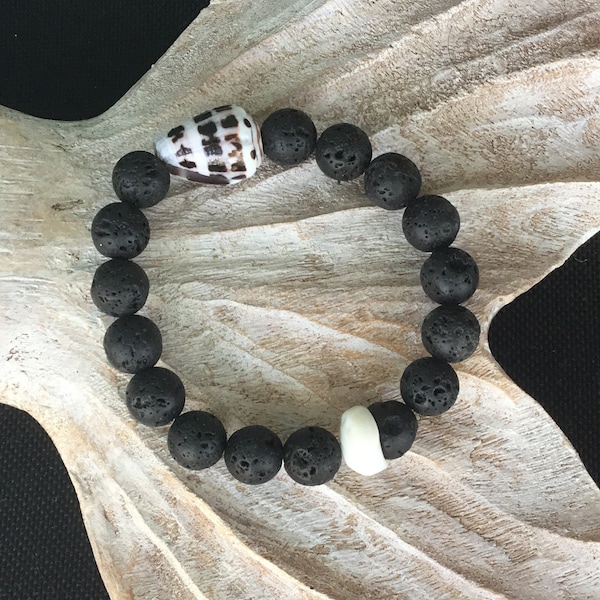 Lava bead bracelet with cone Shell accent