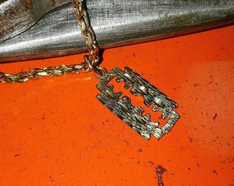 Razor blade charms