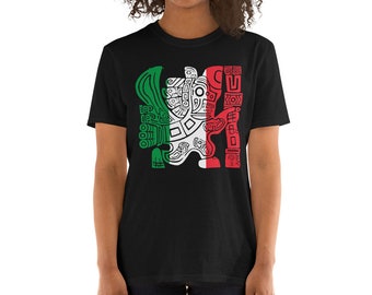 May include: Black t-shirt featuring a stylized graphic in green, white, and red, resembling a flag. The design includes geometric shapes and a figure. The shirt is short-sleeved and appears to be made of a soft material.