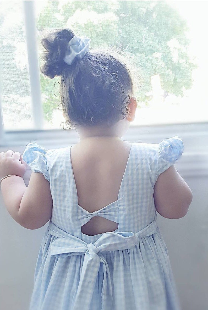 CARRIE smock dress for girl puff sleeves open V-back and with small knot. bluewhite with handmade embroidery