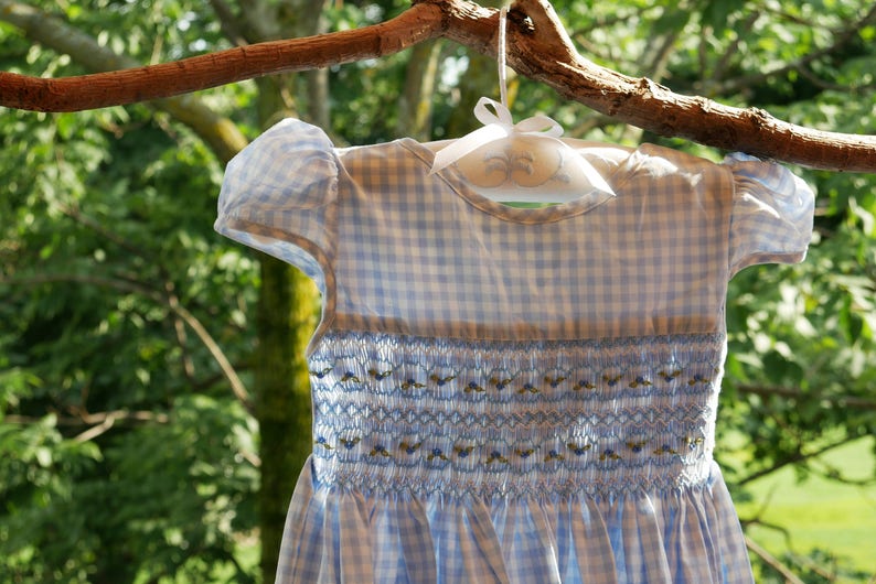 CARRIE smock dress for girl puff sleeves open V-back and with small knot. bluewhite with handmade embroidery