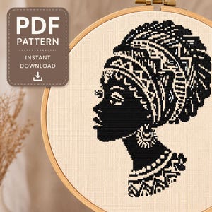 May include: A cross-stitch pattern featuring a black silhouette of a person in profile wearing a patterned headwrap, earrings, and a necklace. The design is displayed in a wooden embroidery hoop on light fabric. Text reads PDF PATTERN INSTANT DOWNLOAD.