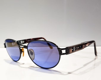 Gafas de sol Moschino con montura vintage italiana, lentes redondas, años 90
