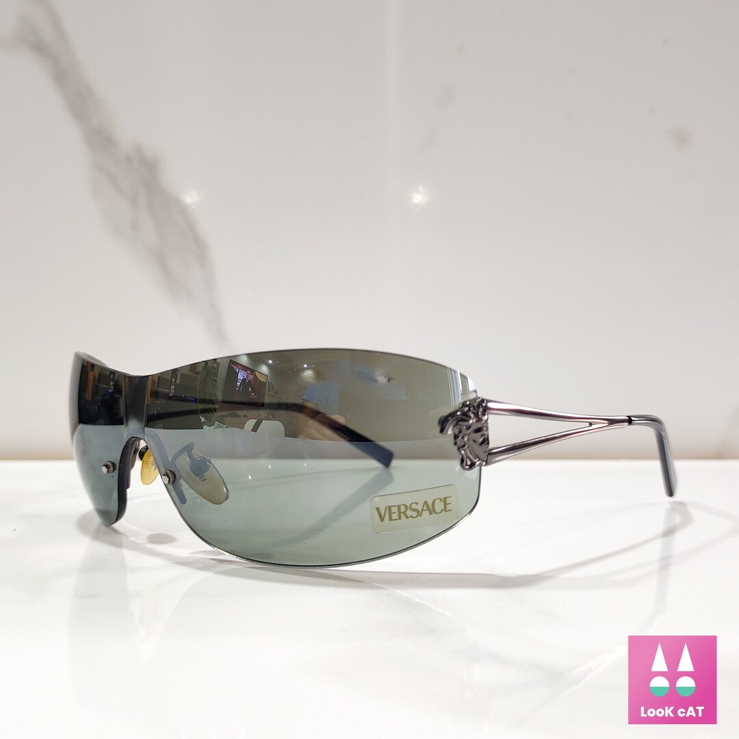 最終値下げ00s versace rimless sunglasses y2k Rare Versace blue rimless sunglasses | 2000s vintage | Depop