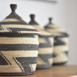 Ethnic storage baskets | Unique monochrome lidded baskets, Ethical African basket with lid from Uganda