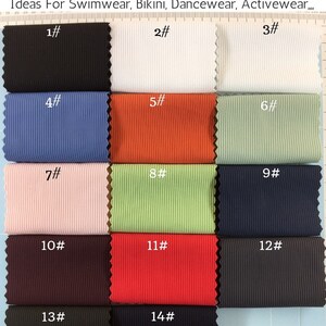May include: A collection of 14 fabric swatches in various colors, featuring a 4-way stretched ribbed texture. The material is composed of 72% nylon and 28% spandex, with a weight of 160GSM and a width of 130CM. Each swatch is numbered 1 through 14.