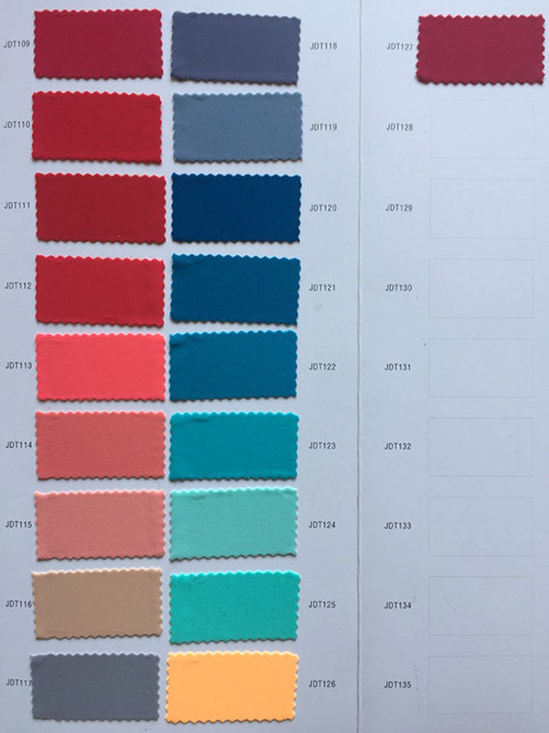 May include: A color chart with fabric swatches in various shades of red, blue, green, and orange. The swatches are labeled with numbers, such as JDT109, JDT110, JDT111, and so on.