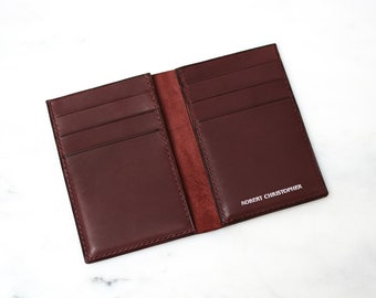 Mens 10 pocket wallet. Handmade from Vegetable tanned leather and hand-stitched with linen thread.