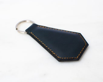 Hand stitched raised keyring made from 100% vegetable tanned leather and French linen thread.